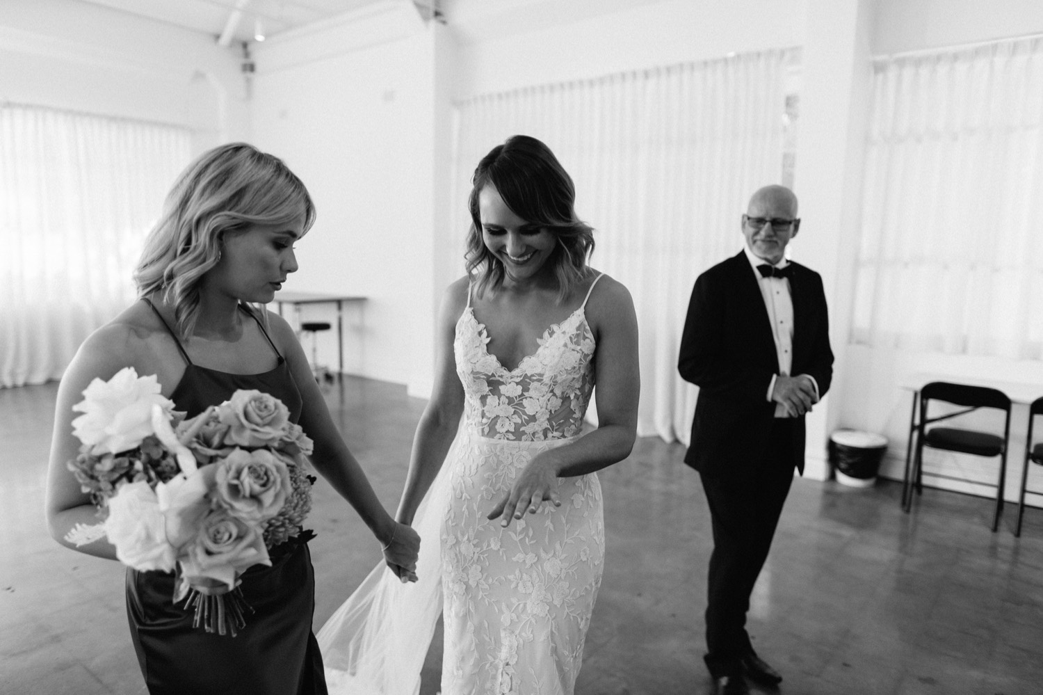 bride showing bridesmaid her shaking hands