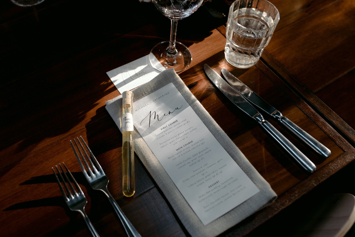 close up of place setting at three blue ducks with gentle sun through window