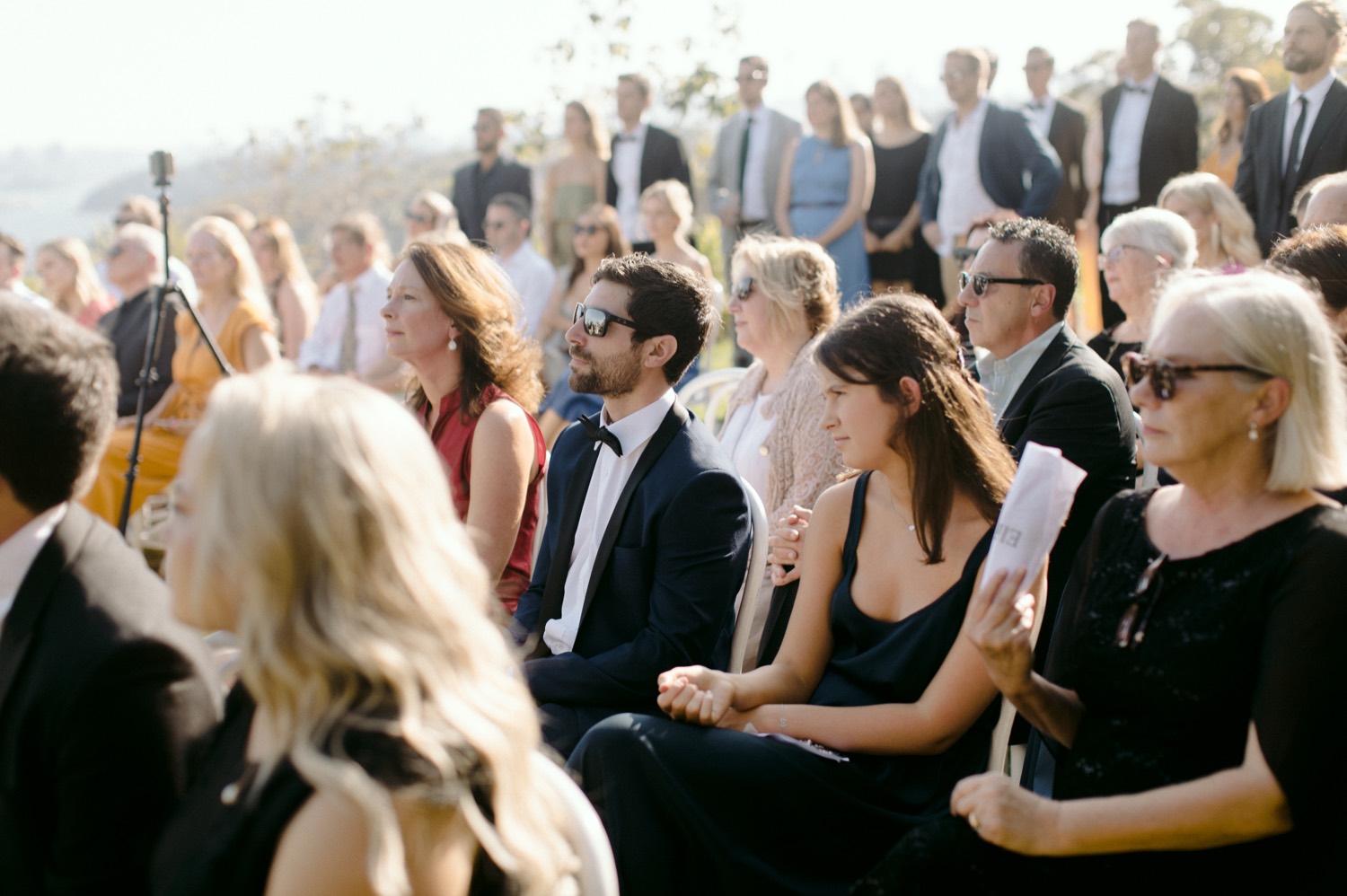 seated guest enjoying ceremony
